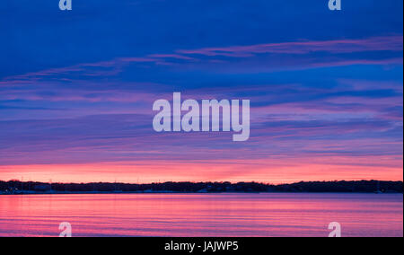 vivid sunset in Sag Harbor, NY Stock Photo