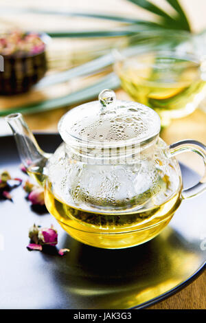 Verbena,Mint and Rose buds as mix herbal tea in a tea pot Stock Photo