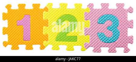 123 numbers created from Alphabet puzzle isloated on white background , with clipping path. Stock Photo