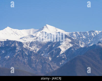 From the M5 road in northern Azerbaijan between Sheki ane Balakan, you have stunning views of the High Caucasus mountains and deep river valleys Stock Photo