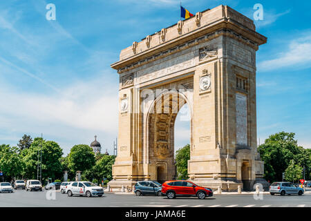 BUCHAREST, ROMANIA - MAY 24, 2017: Built in 1936 Arcul de Triumf is a triumphal arch located in the northern part of Bucharest on Kiseleff Road. Stock Photo