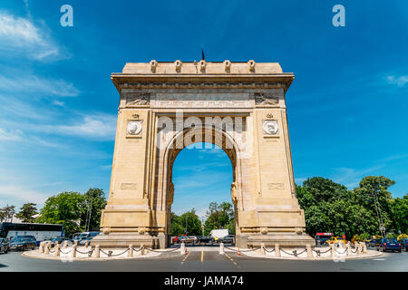 BUCHAREST, ROMANIA - MAY 24, 2017: Built in 1936 Arcul de Triumf is a triumphal arch located in the northern part of Bucharest on Kiseleff Road. Stock Photo