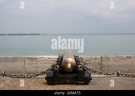 Ceremonial cannons point out towards the Solent outside the Royal Yacht Squadron in Cowes, Isle of Wight. Stock Photo