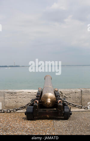 Ceremonial cannons point out towards the Solent outside the Royal Yacht Squadron in Cowes, Isle of Wight. Stock Photo