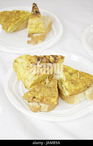 Spanish potato omelette with bread in food, food market Stock Photo