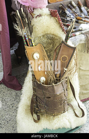 Indian Arrows in skin leather bag, old weapons Stock Photo