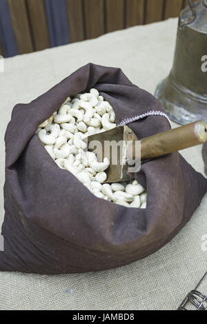 White beans in canvas sack on market feed, food Stock Photo