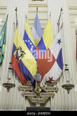 Latin American Flags with scales of justice in church, culture and history Stock Photo