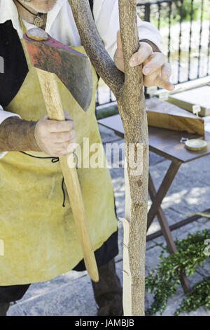 Cutting trees with handmade ax, work Stock Photo