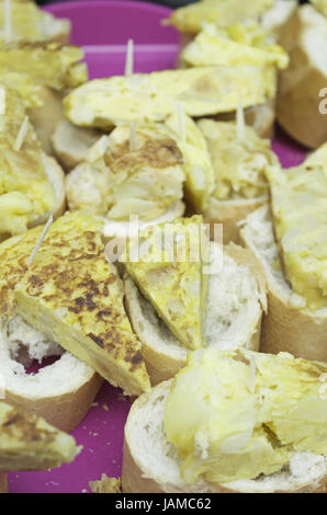 Potato omelette with bread in Spanish restaurant, food and celebration Stock Photo