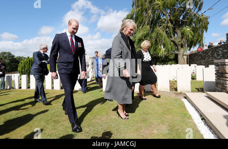 The Duke of Cambridge and Princess Astrid of Belgium leave after he laid a wreath at the 16th Irish Division Memorial Cross during a ceremony at Wytschaete Military Cemetery, Belgium. Stock Photo