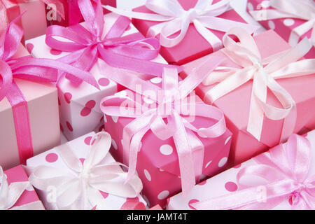 Gift package,pink,Christmas,Valentinstag,birthday,Mother's Day,jubilee,Valentinsgeschenke,birthday presents,Mother's Day presents,Christmas presents,small,sweetly,presents,presents,packs,affectionately,sanding,spot,dots,spotted,scored,brightly,huge number,many,icon,give,distribution of presents,surprise,prejoy,colour tuning,colour,pink-white,pink,white,studio,background, Stock Photo