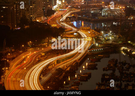 Island Eastern Corridor Motorway through Causeway Bay and  Wan Chai, Hong Kong, China Stock Photo