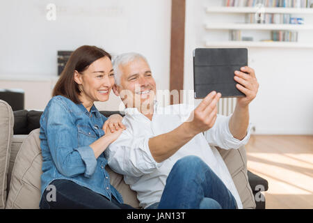 Mature couple chatting on line Stock Photo