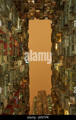 Apartments at dusk, Hong Kong, China Stock Photo