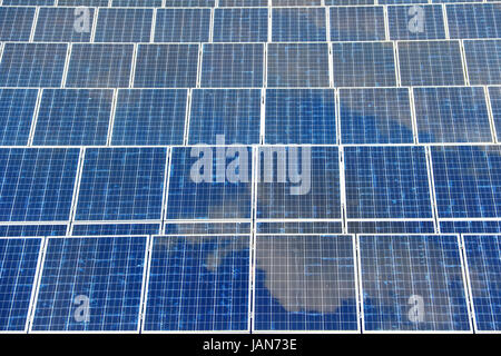 Detail of solar panel with reflection blue sky. Solar panel texture. Stock Photo