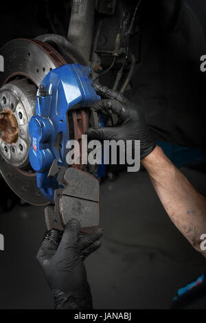 Brake change on BMW M3 to custom sports brakes Stock Photo - Alamy