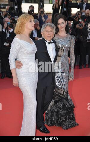 Emmanuelle Seigner, Roman Polanski, Eva Green (dress by Alexander McQueen)  Arriving on the red carpet for the film 'Based on a True Story'  70th Cannes Film Festival  May 29, 2017 Photo Jacky Godard Stock Photo