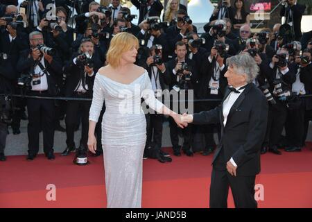 Emmanuelle Seigner, Roman Polanski  Arriving on the red carpet for the film 'Based on a True Story'  70th Cannes Film Festival  May 27, 2017 Photo Jacky Godard Stock Photo