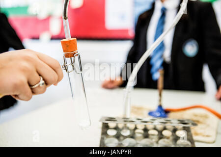 girls in chemistry lesson Stock Photo