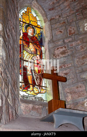 Stained Glass window with St Christopher in St Nicholas Ringmore in the Parish in Shaldon Devon England Stock Photo