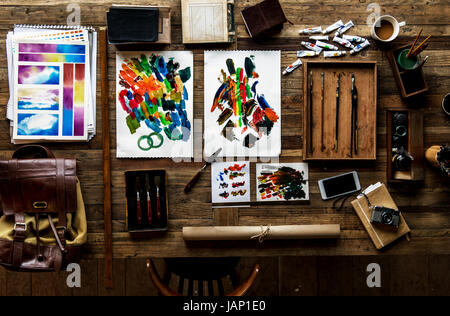 Aerial view of artistic euqipments painting tools on wooden table Stock Photo