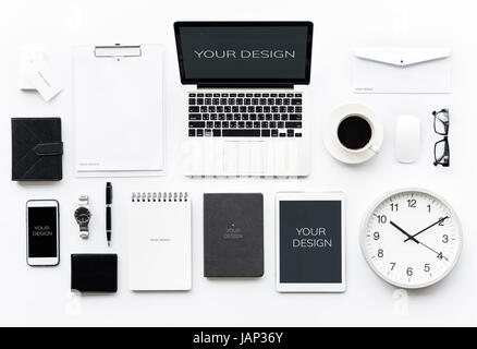 Aerial view of computer laptop with office stationery isolated on white Stock Photo