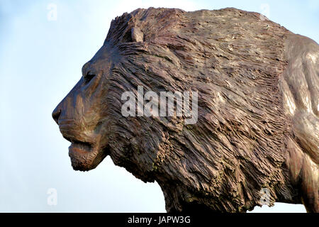 Longleat House, Wiltshire, UK. 17th March, 2016. A magnificent sculpture of a lion by African based sculptor Bruce Little. Stock Photo