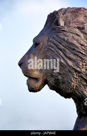 Longleat House, Wiltshire, UK. 17th March, 2016. A magnificent sculpture of a lion by African based sculptor Bruce Little. Stock Photo