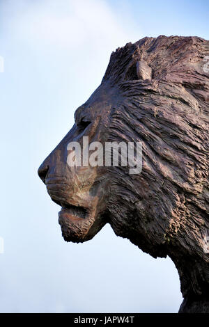 Longleat House, Wiltshire, UK. 17th March, 2016. A magnificent sculpture of a lion by African based sculptor Bruce Little. Stock Photo