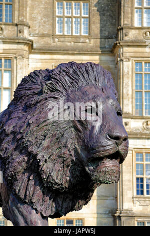 Longleat House, Wiltshire, UK. 17th March, 2016. A magnificent sculpture of a lion by African based sculptor Bruce Little. Stock Photo