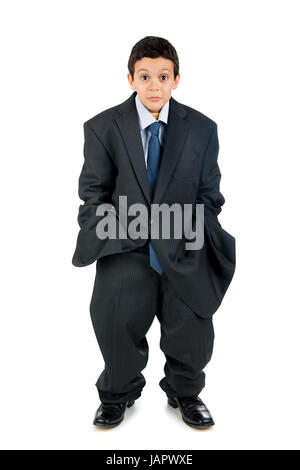 Young boy dressed with a big man's suit Stock Photo