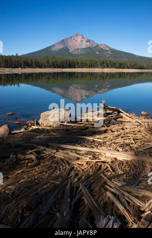 Four Mile Lake shows a nearly perfect reflection for Mt McLoughlin Stock Photo