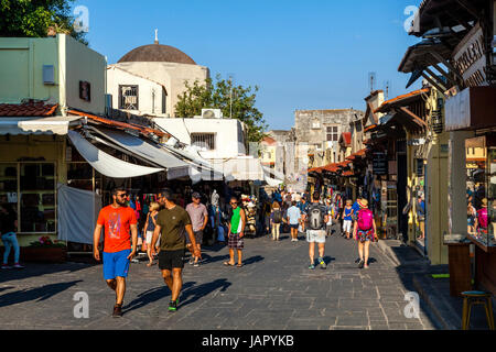 Tourists Walking In Rhodes Old Town, Rhodes, Greece Stock Photo