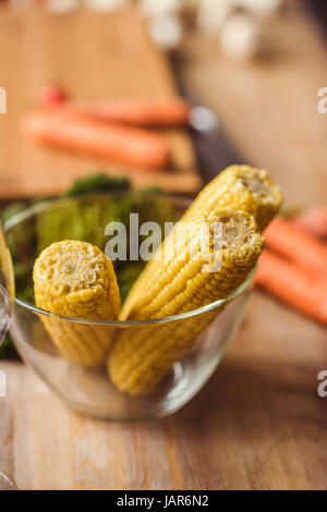 Corn cobs in bowl Stock Photo