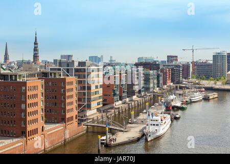 Hamburg, Germany - May 17, 2017: Museum ships in Sandtorhafen basin at HafenCity quarter. Stock Photo