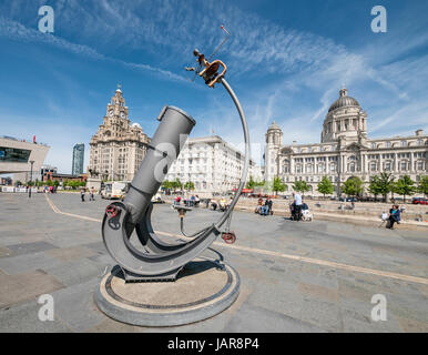 Sculpture in front of The Three Graces of Liver Building, Cunard Building and Dock Offices Liverpool UK Stock Photo