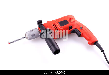 Orange electric drill with handle isolated on white background. Stock Photo
