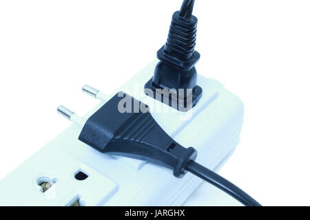 plugs plugged into electric power bar Stock Photo