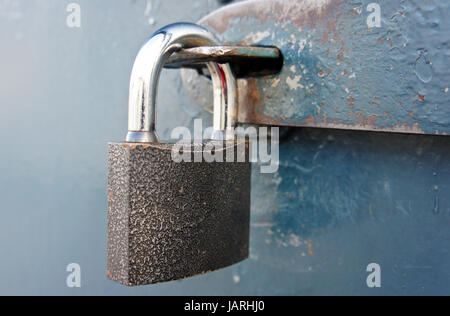 Close up of padlock. Steel door. Stock Photo