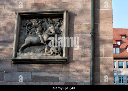 Relief on a typical sandstone wall, Nuremberg, Bavaria, Germany Stock Photo
