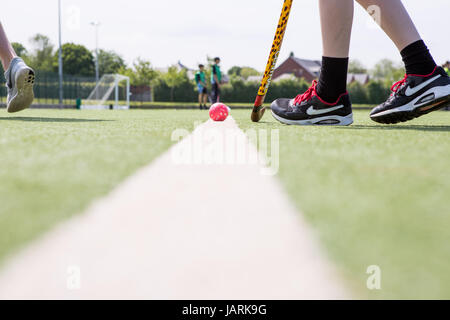 playing hockey shot from low down perspective Stock Photo