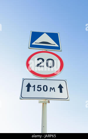 Traffic signs Maximum speed limit , artificial unevenness and Coverage Stock Photo