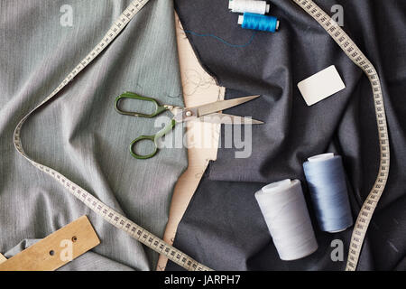 Sewing Tools on Tailors Table Stock Photo
