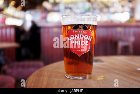 Pint of Fullers London Pride Best Bitter beer in British pub Stock Photo