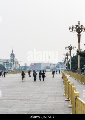 BEIJING, CHINA - MARCH 19, 2017: tourists and view Zhengyangmen East Railway Station, part of the China Railway Museum on Tiananmen Square in spring.  Stock Photo