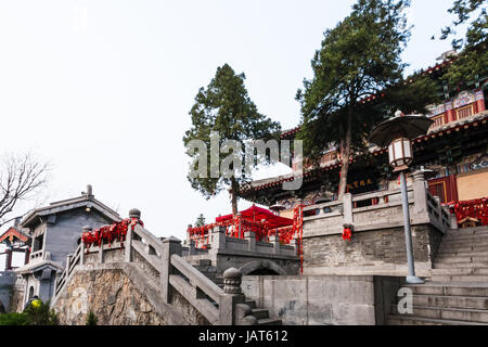 LUOYANG, CHINA - MARCH 20, 2017: buildings of Xiangshan Temple on East Hill of Buddhist monument Longmen Grottoes in spring. The complex was inscribed Stock Photo