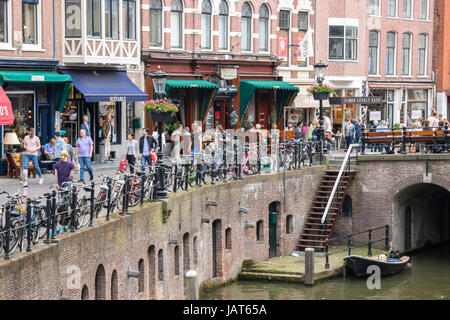 View of the historic city center with people at the Oudegracht (Old Canal) and the Vismarkt street (Fish Market). Utrecht, The Netherlands. Stock Photo