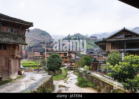 DAZHAI, CHINA - MARCH 23, 2017: view of Dazhai Longsheng village in spring. This is central village in famous scenic area of Longji Rice Terraces in C Stock Photo