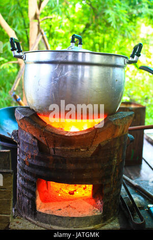 Rice cooker, boiling in the aluminum pot on Stove Stock Photo